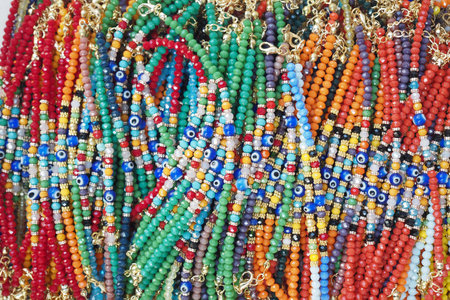 Explore our vibrant, multicolored collection of beautifully crafted beaded accessories todayの写真素材