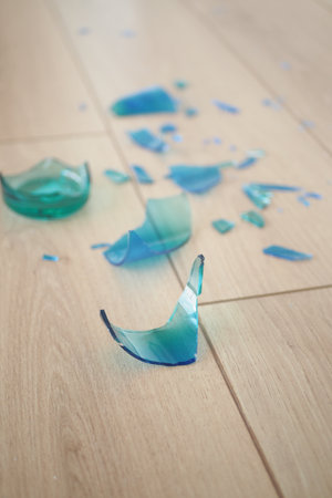 Breaking of a glass on a floor,の写真素材