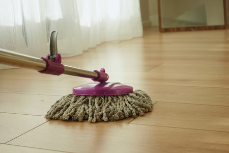 Achieve Efficient Floor Cleaning with a Mop on Your Wooden Surface for Optimal Results