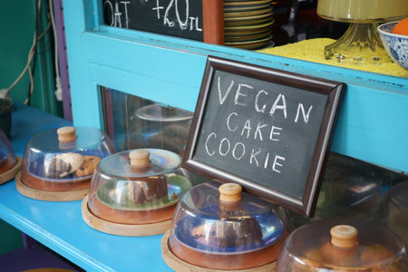 A Stunning and Vibrant Display of Vegan Treats at a Beautifully Colorful Artisan Bakery Cafe