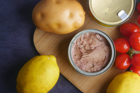 canned tuna on wooden table ,の写真素材