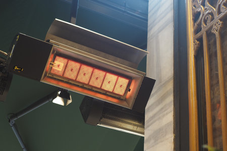 Modern electric infrared heater on ceilingの写真素材