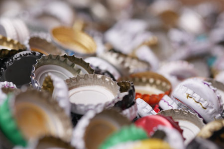 Close-Up of Colorful Bottle Caps in a Random Arrangementの写真素材