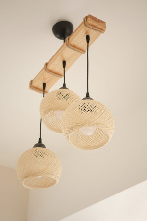 Stylishly Designed Elegant Bamboo Pendant Lights Featuring a Beautiful Wooden Fixtureの写真素材