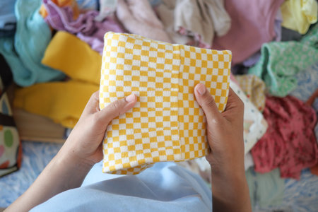 Effectively Organizing a Varied Collection of Colorful Fabrics and Textiles for Craft Projects