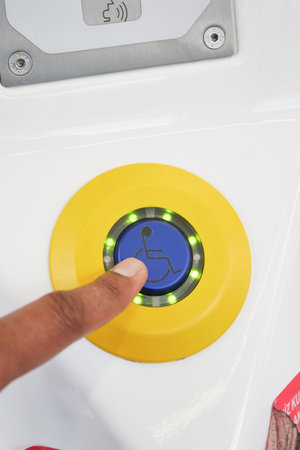 Push To Open Disabled Button In a Metro Train .の写真素材