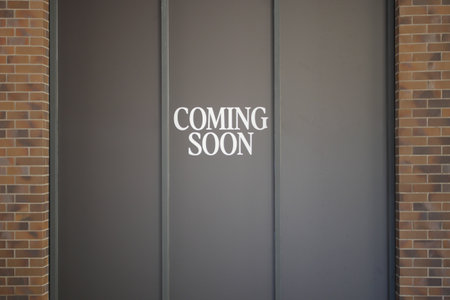 Highquality Coming Soon Sign Announcement on Dark Background for an Upcoming Eventの写真素材