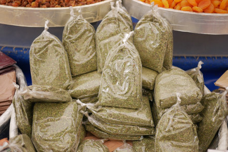 Various Packs of Dried Gourmet Herbs Available at the Market Stallの写真素材