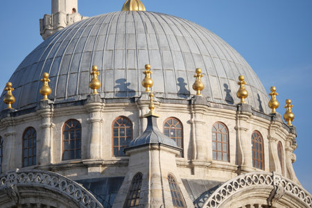 Close View of an Ornate Domed Roof Adorned with Golden Finialsの写真素材