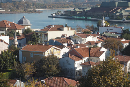 Charming Coastal Views of a Quaint Town with Red-Tiled Roofsの写真素材
