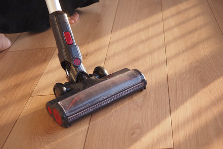 cleaning floor dust with vacuum cleaner.の写真素材