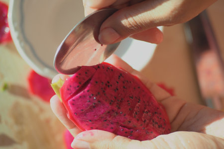 Preparing Fresh Dragon Fruit for Your Enjoyment and Culinary Delightの写真素材