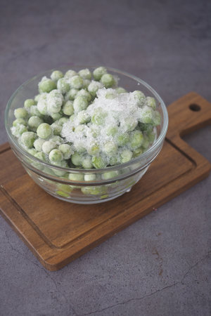 Frozen Green Peas Available in a bowlの写真素材