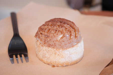 A mouthwatering and delightful creamy dessert topped with a brown sugar glazeの写真素材