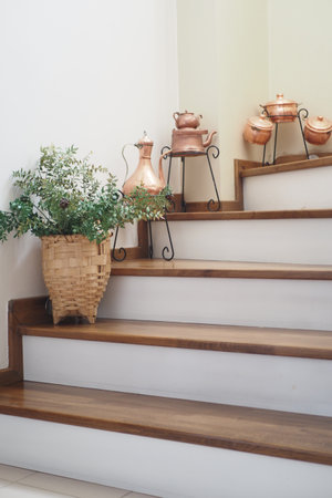 An Elegant Indoor Staircase that Features Decorative Items and Accentsの写真素材