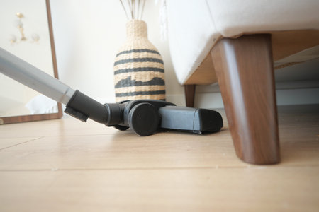 cleaning floor dust with vacuum cleaner.の写真素材