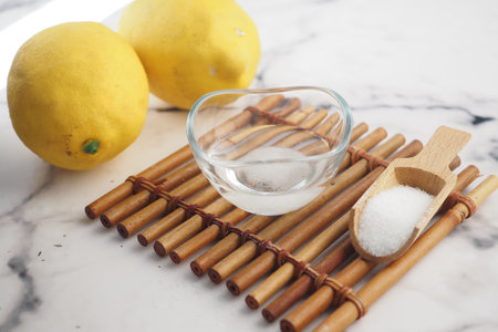 Baking soda and whole lemon on tableの写真素材