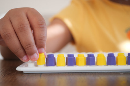 Engaging Child Learning with a Fun and Educational Abacus for Enhanced Development and Creativityの写真素材
