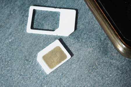 A sim card for a smart phone on tableの写真素材
