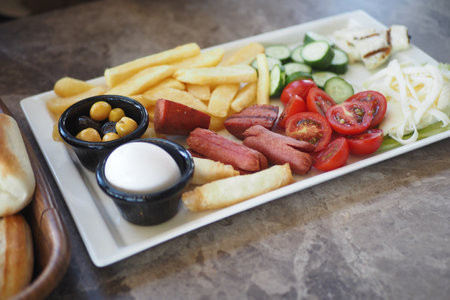 Delectable Breakfast Platter with Fresh Vegetables and Satisfying Sidesの写真素材