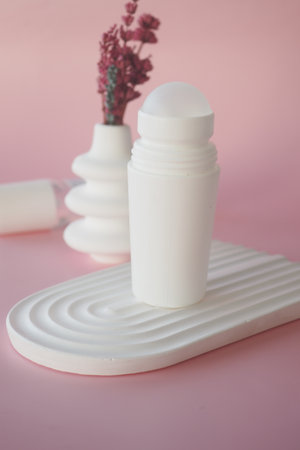 deodorants and cream container on tableの写真素材