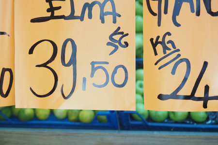 Explore Fresh Market Produce with EyeCatching Price Tags Displayed in Vibrant Colorsの写真素材