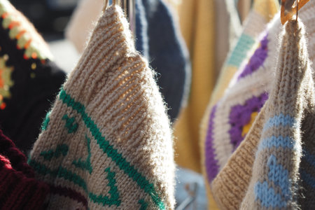Bright and Colorful HandKnit Bags Beautifully Hanging in the Sunlightの写真素材