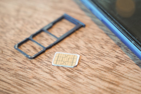 A sim card for a smart phone on tableの写真素材