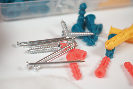 A collection of screws and wall anchors for your DIY projectsの写真素材