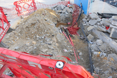 Excavation at a Construction Site with Proper Safety Barriers in Placeの写真素材