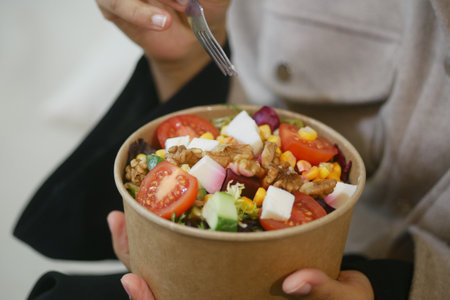 Enjoy a Healthy Salad Bowl made with Fresh Ingredients and bursting with Delicious Flavorの写真素材