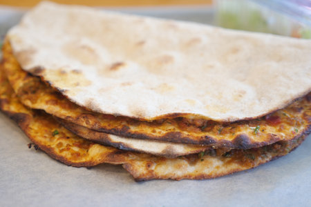 A Stack of Flavorful and Delicious Flatbreads Enhanced with Spicesの写真素材