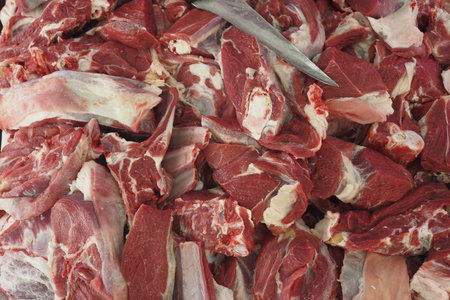 Freshly Sliced, HighQuality Cut Meats Stacked Neatly on a Butchers Wooden Table Topの写真素材