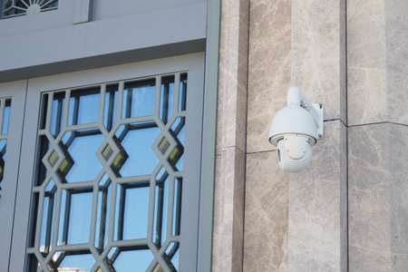 Security Camera Successfully Mounted on the Wall for Optimal Surveillance Purpose and Useの写真素材