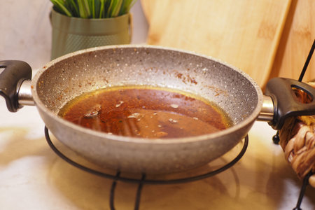 used cooking oil in frying pan.の写真素材