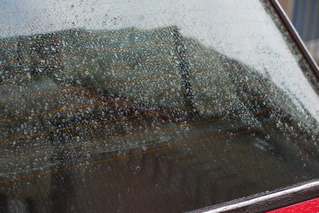 A CloseUp View of a Foggy Windshield on a Rainy Day, Capturing the Atmosphere and Moodの写真素材