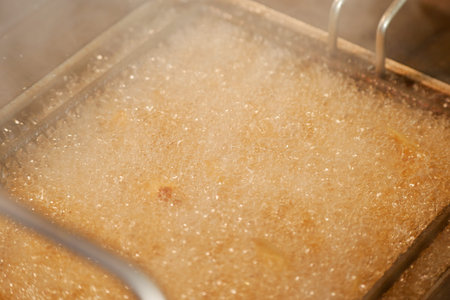 Fried food in hot oilの写真素材