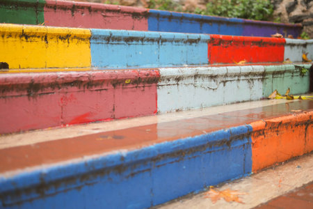 A Vibrant Display of Colorful Steps with a Reflection of Rain Water