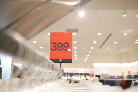 A price tag displaying '399' in a modern store interior setting