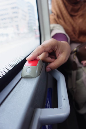 Closeup of Bus bell switch for stop inside the public busの写真素材