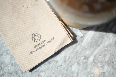 Eco-Friendly Napkin Made From Recycled Materials on Marble Surfaceの写真素材