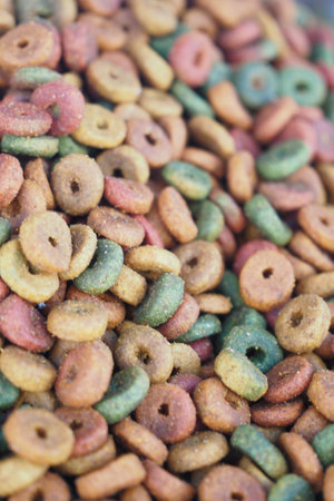 Colorful Ring-Shaped Cereal Spread in a Background Close-Upの写真素材