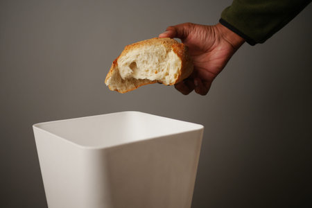 Properly Discarding Unwanted Bread in a Trash Bin for Environmental Care