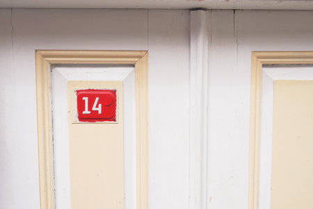The sign on Room Number 14 located on an Old Hotel Doorの写真素材