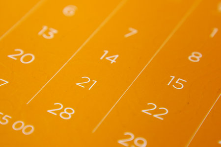 detail shot of a calendar on table,の写真素材