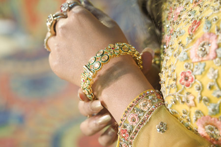 Beautiful golden bracelet worn at a festive celebration
