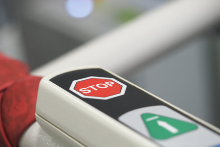 Important stop signal on a barrier at a public transit station