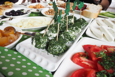 Festive table laden with fresh appetizers during a gatheringの写真素材
