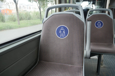 Empty public bus seats in urban areaの写真素材