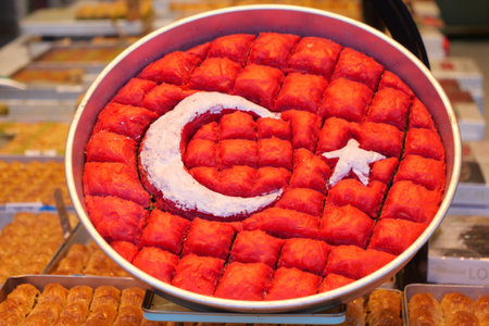 Traditional Turkish dessert with national symbols at a marketplaceの写真素材